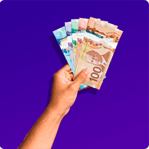 Dollar canadien en main